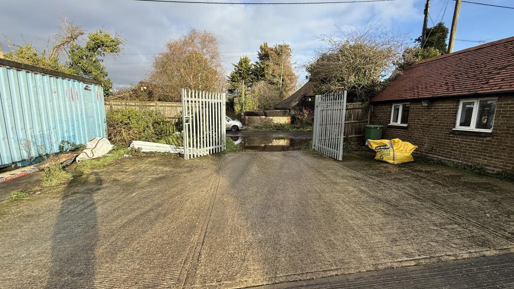 Lot: 48 - SUBSTANTIAL AGRICULTURAL HOLDING WITH BUILDINGS - External image of gated entrance